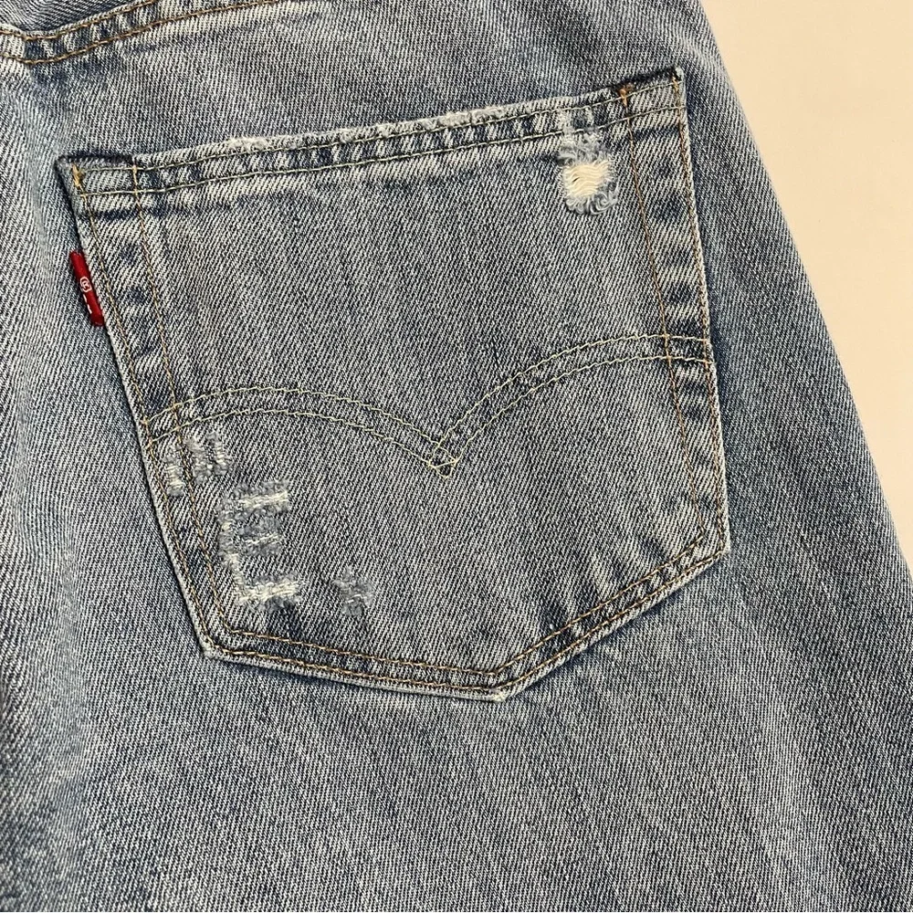 LEVI’S 511 distressed jeans
